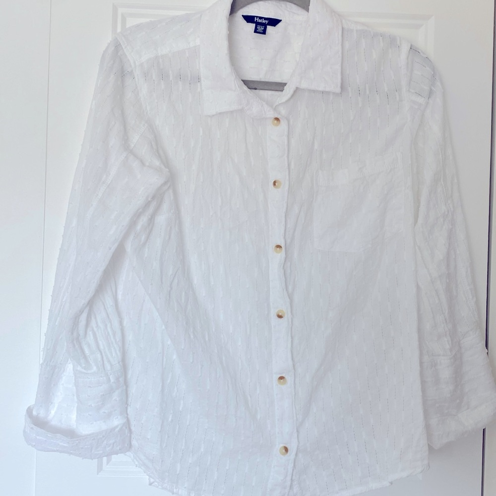 Cutest white button up! So many ways to style..buttoned, open, tied, etc!